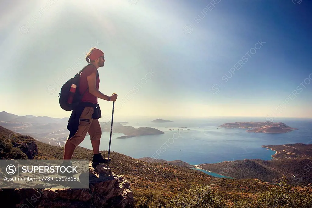 Male Hiker Overlooking The View From Mountain At Antalya Turkey