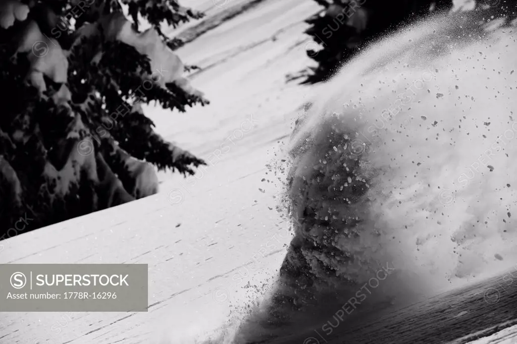 A snowboarder rips untracked powder turns in Colorado.