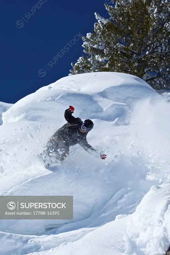 A man skis in powder snow in Wyoming.