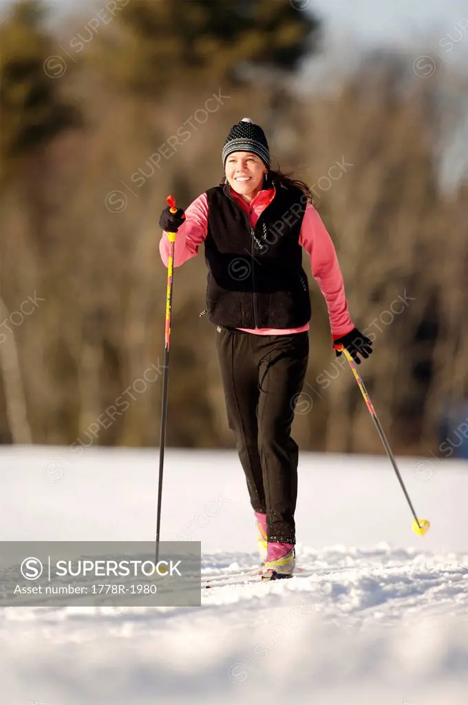 Woman cross_country skiing.