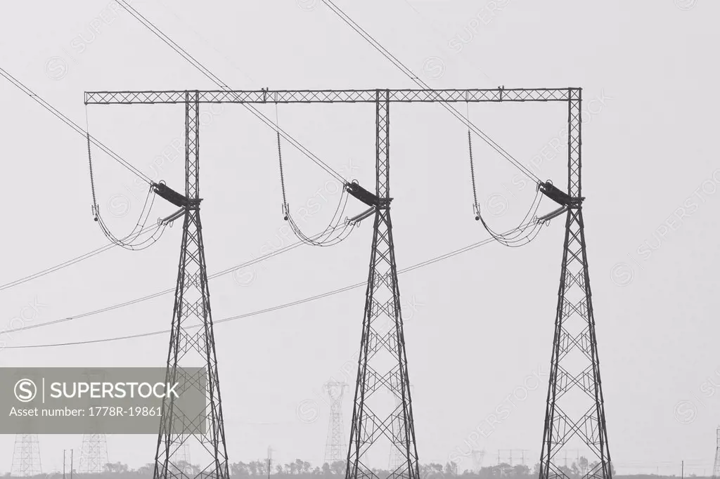 Electrical power transmission lines and towers