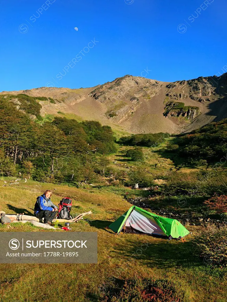 Backpacker and tent on Dientes Circuit, Isla Navarino, Tierra Del Fuego, Chile