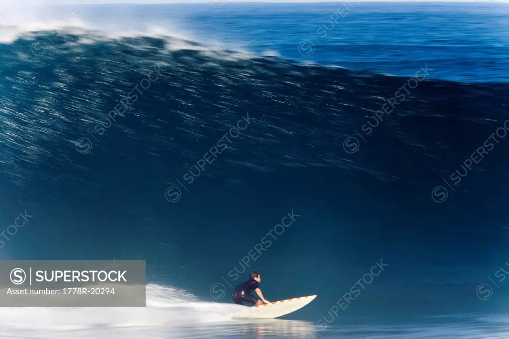 A surfer, captured in Speed Blur fashion at world famous Pipeline, on the north shore of Oahu, Hawaii.