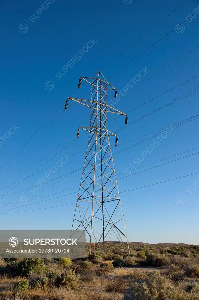 An electrical transmission tower and power lines in San Bernadino county in southern CA.