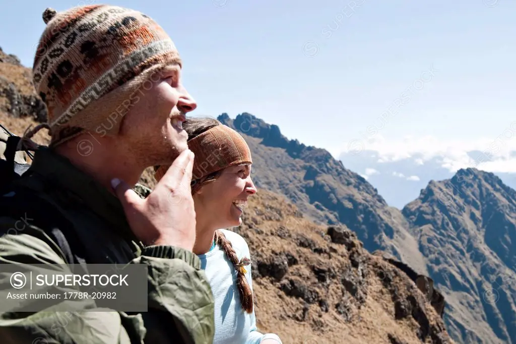 Two young people enjoy themselves on Dead Woman´s Pass, Inca Trail.