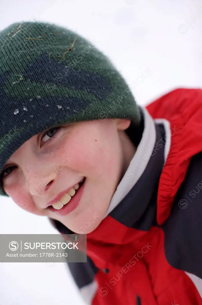 Portrait of young boy in winter.
