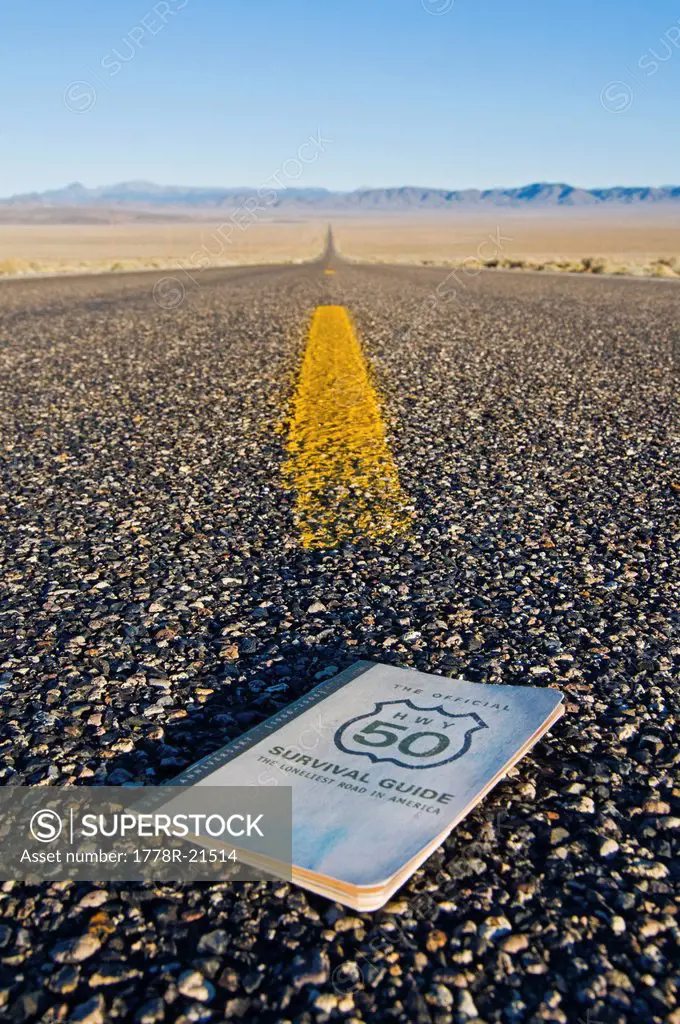 The Official Highway 50 Survival Guide sits on Highway 50, The Loneliest Road in America, in the Nevada desert.