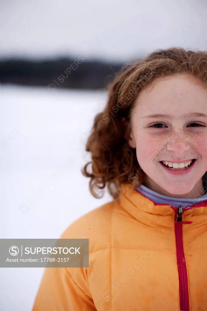 Portrait of young girl in winter.
