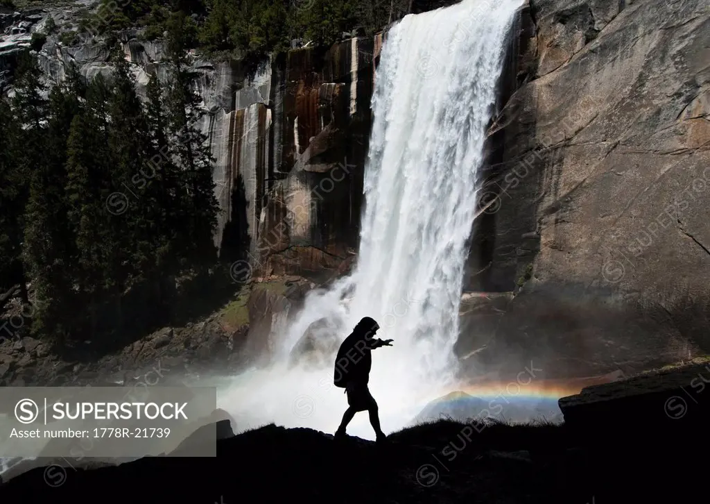 A man hikes along the Mist Trail to Vernal Fall in Yosemite National Park, California.