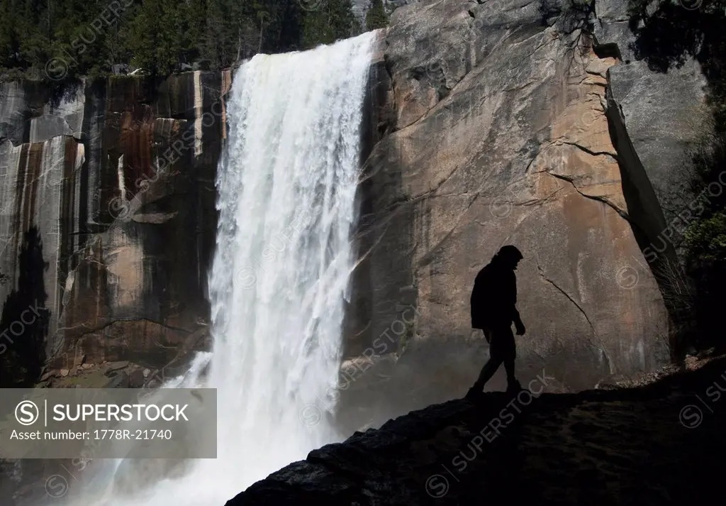 A man hikes along the Mist Trail to Vernal Fall in Yosemite National Park, California.