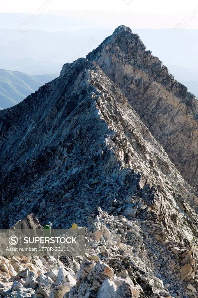 A man descending Capitol Peak, White River National Forest, Aspen, Colorado.