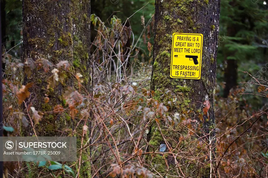 No Trespassing sign along the north shore of Lake Quinault, Olympic National Park, Washington.