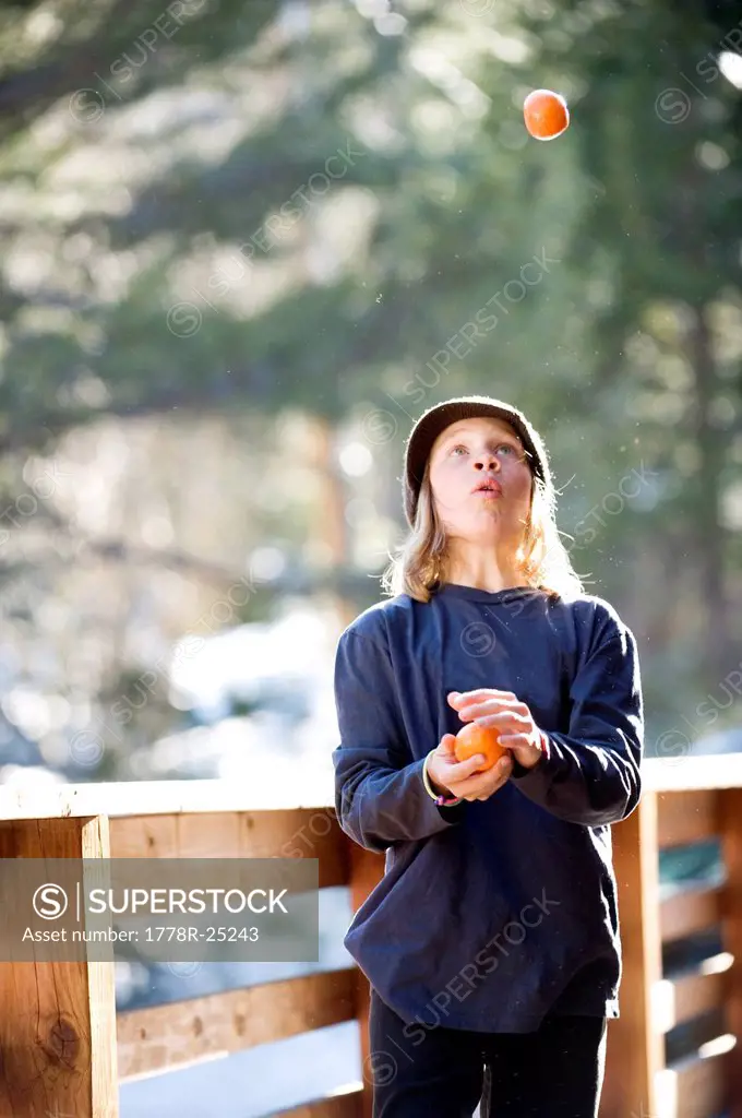 A boy juggles in Lake Tahoe, California.