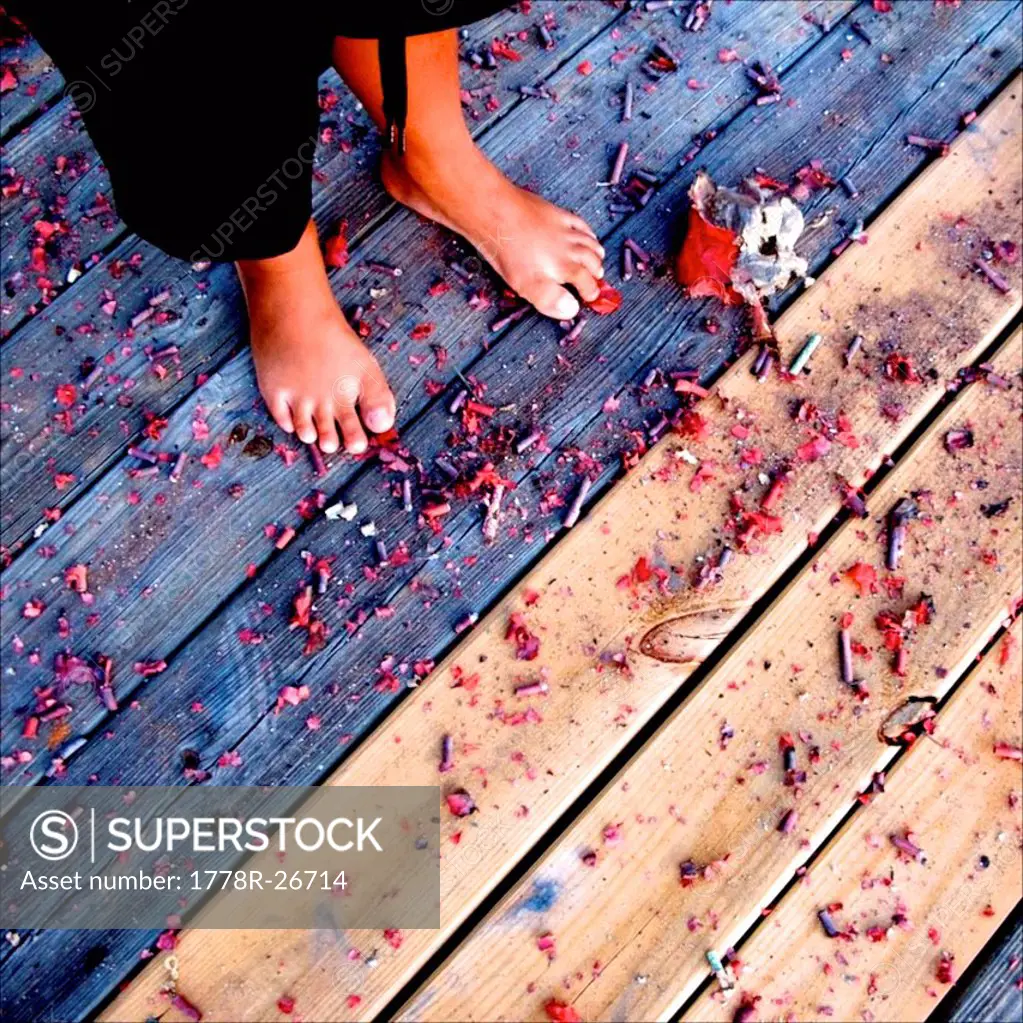 Used firecrackers on a dock