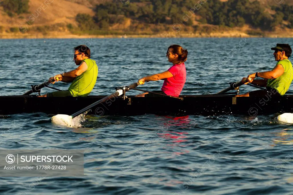 Men and women of the Lake Casitas Rowing Team work on some drills at Lake Casitas in Ojai, California.