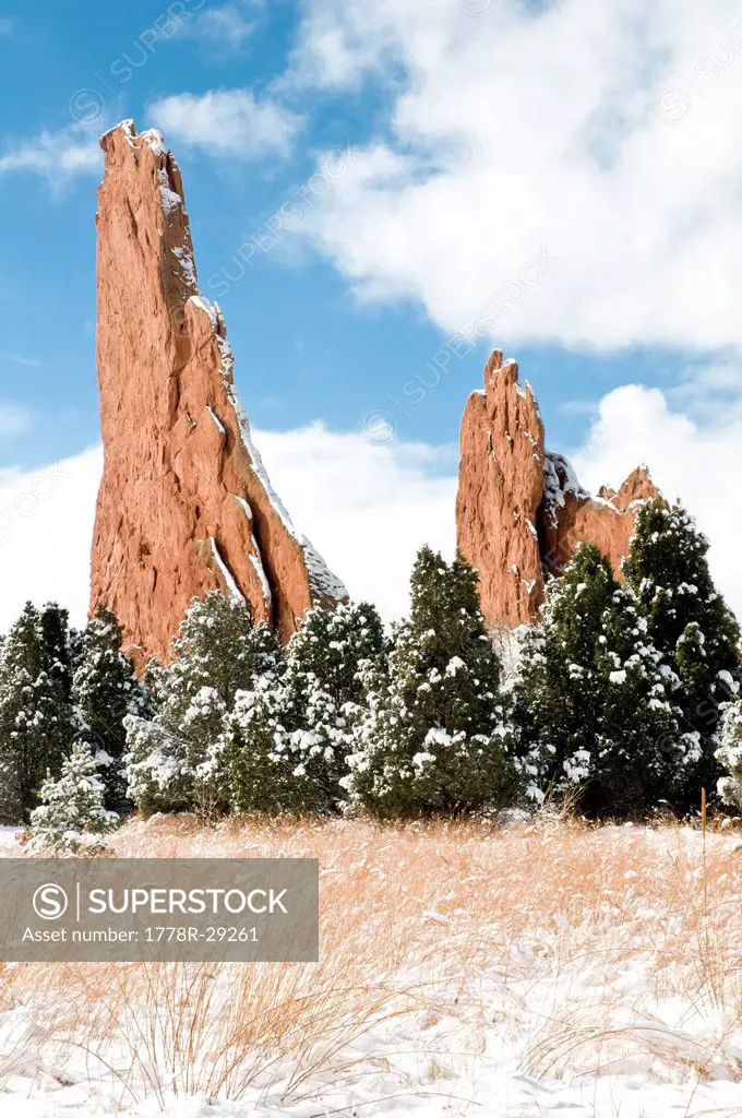 Clearing snow storm on rock towers and grasses at Garden of the Gods National Natural Landmark. Colorado Springs, Colorado