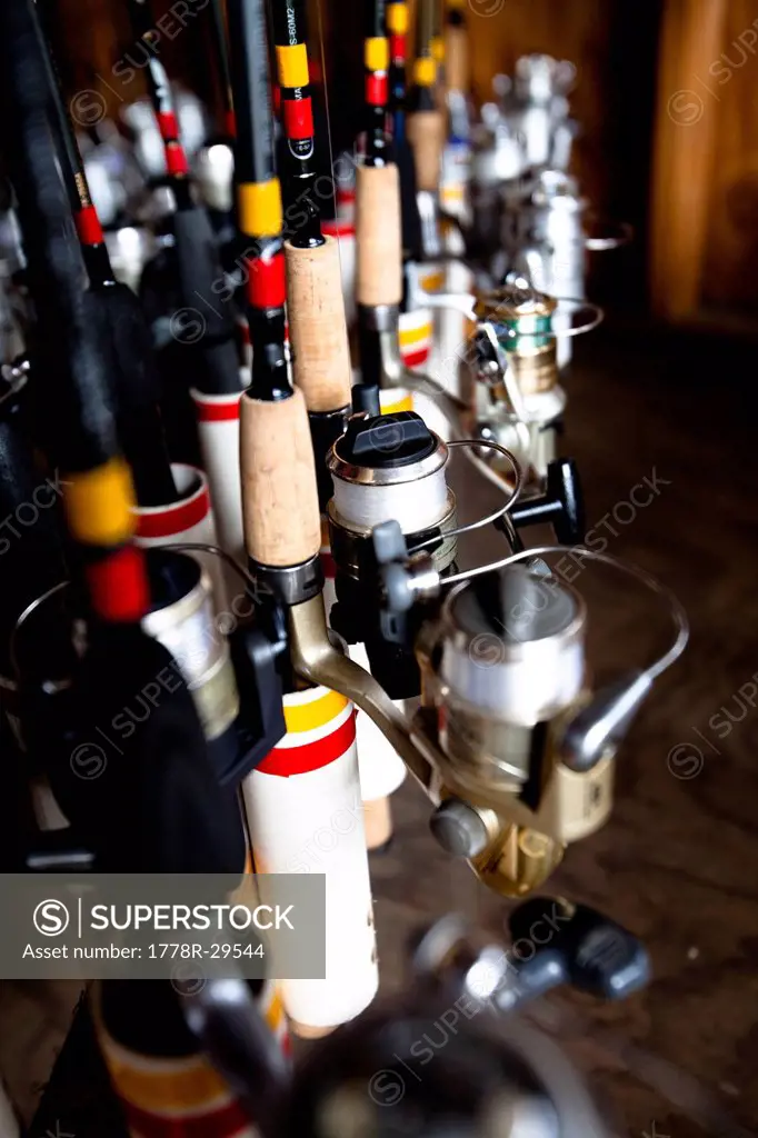 Several spinning reels await use at Oso Lake in Mission Viejo, California.