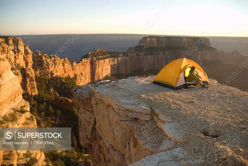 Woman camps in tent, Grand Canyon.