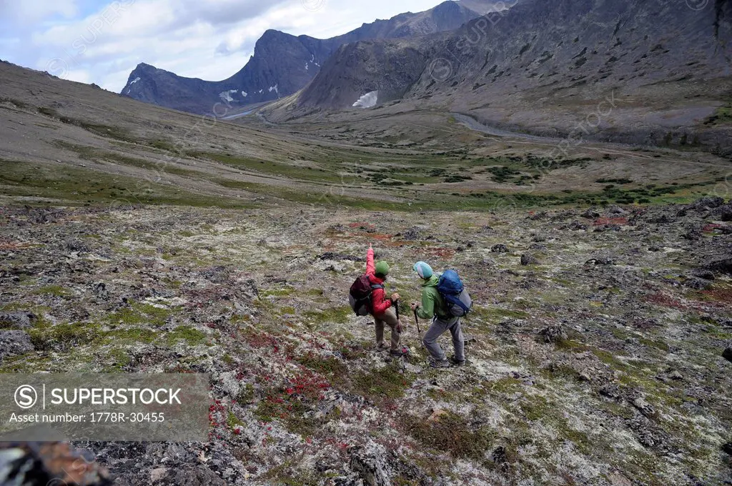 Backpackers hike in Chugach State Park near Anchorage, Alaska.