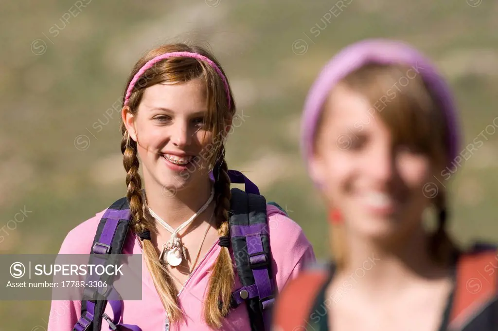 Two girls hiking.