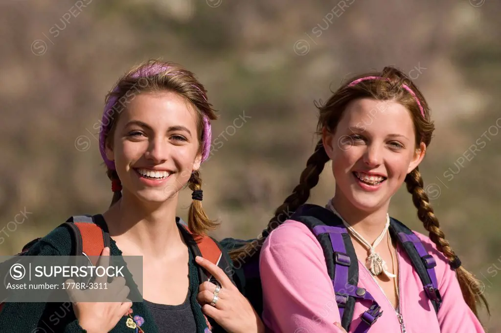 Two girls hiking.