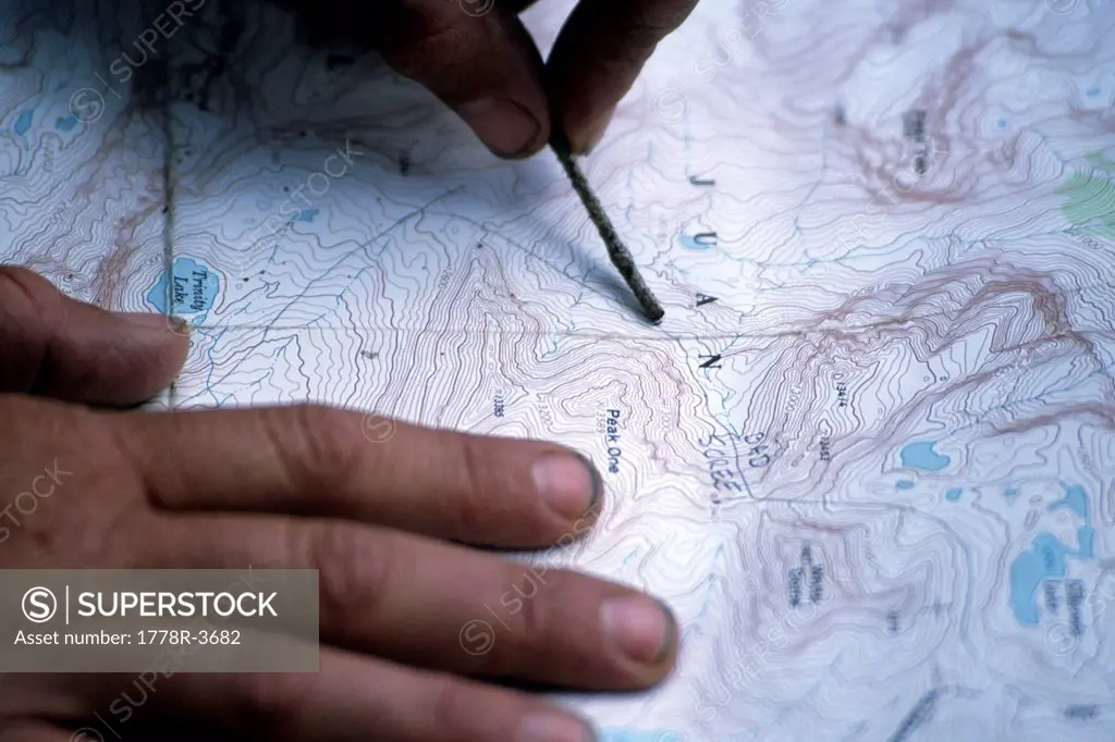 Hiker reading map.