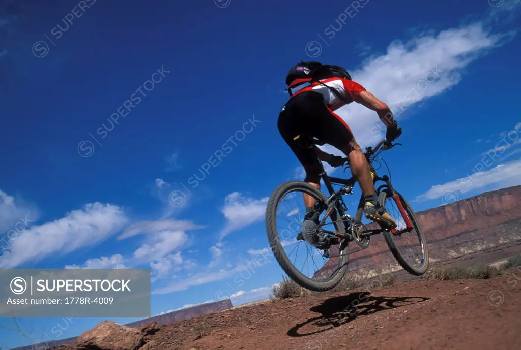 Mountain biker jumping.
