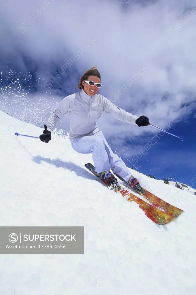 Woman spring skiing in Utah.