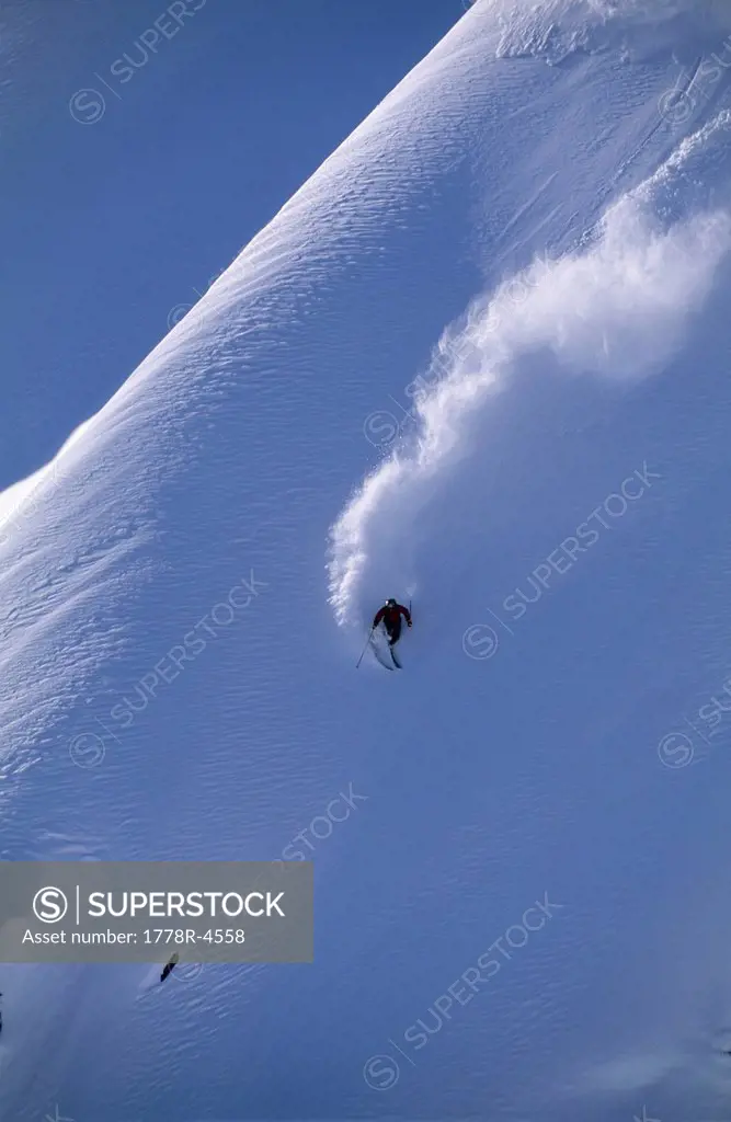 Man heli skiing in BC, Canada.