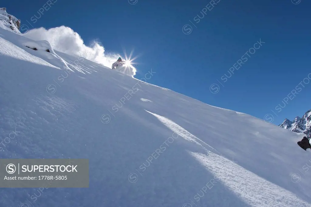 A skier carves in perfect powder in Chile.