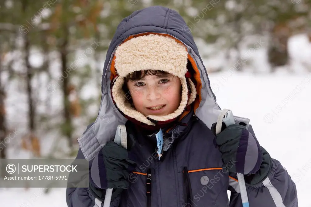 Portrait of young boy, while Cross Country Skiing in Dayton, Maine.
