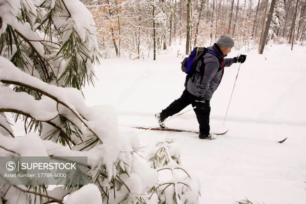 A man Cross Country Skiing in Dayton, Maine.