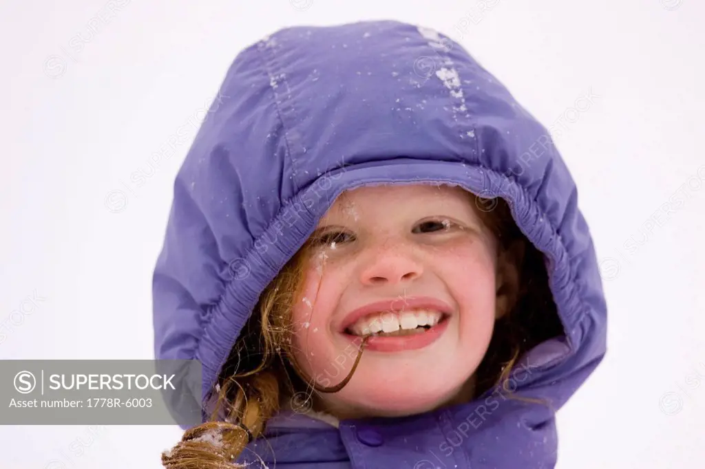 Portrait of young girl Cross Country Skiing in Dayton, Maine.