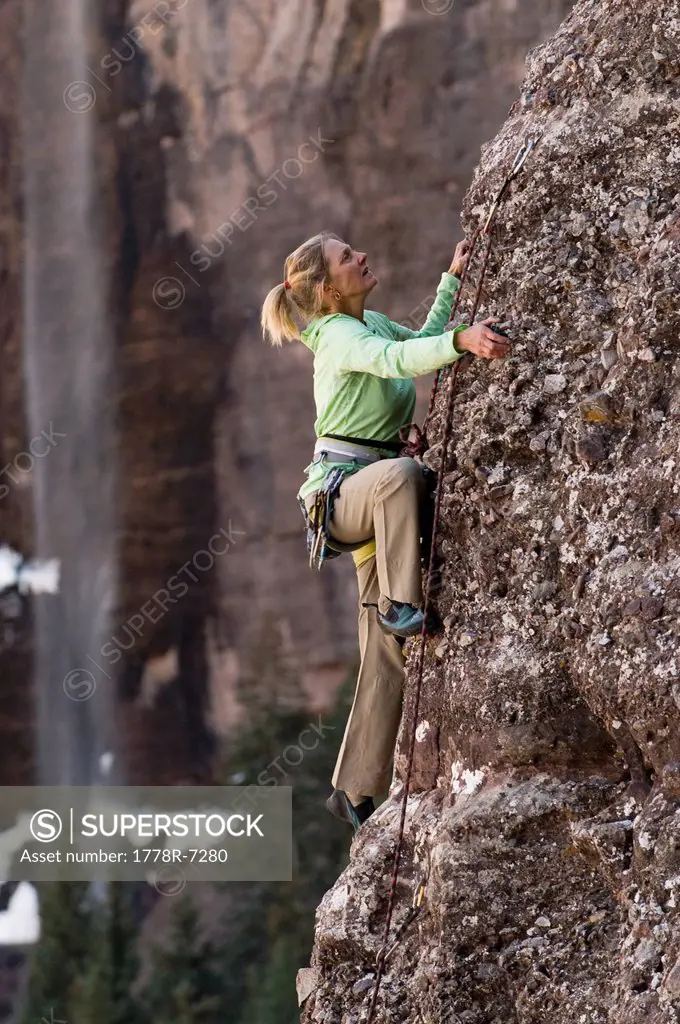 A woman climbing an arete, Telluride, Colorado.