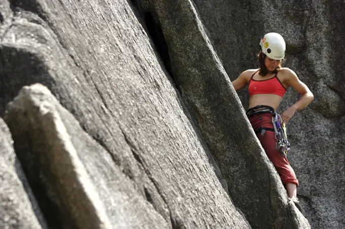 Young woman climbing in Squamish, BC, Canada