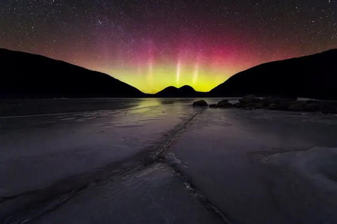 The Northern Lights over frozen Jordan Pond in Acadia National Park.