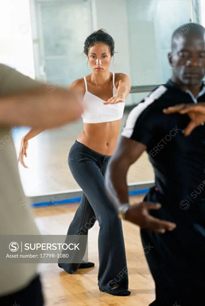 Woman stretching in exercise class