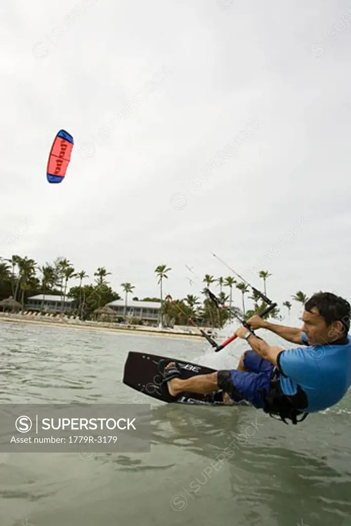 Man kiteboarding on ocean in Islamorada, Florida