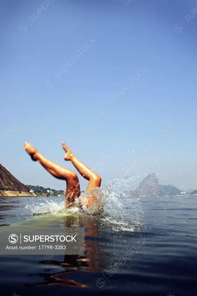 Womans legs above water