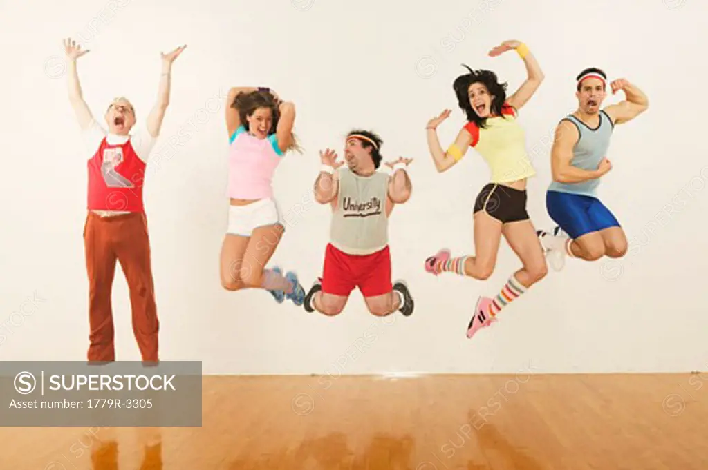 People in exercise gear jumping in mid-air