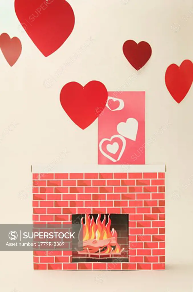 Cardboard fireplace with heart decorations