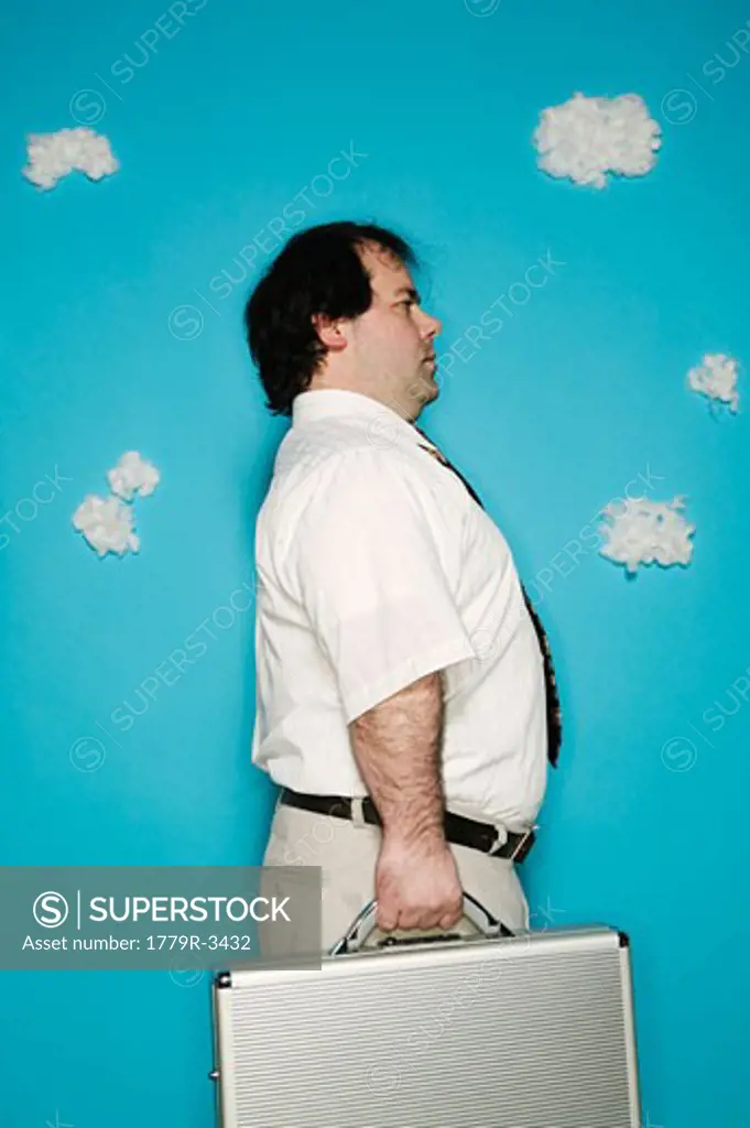 Man carrying metal briefcase