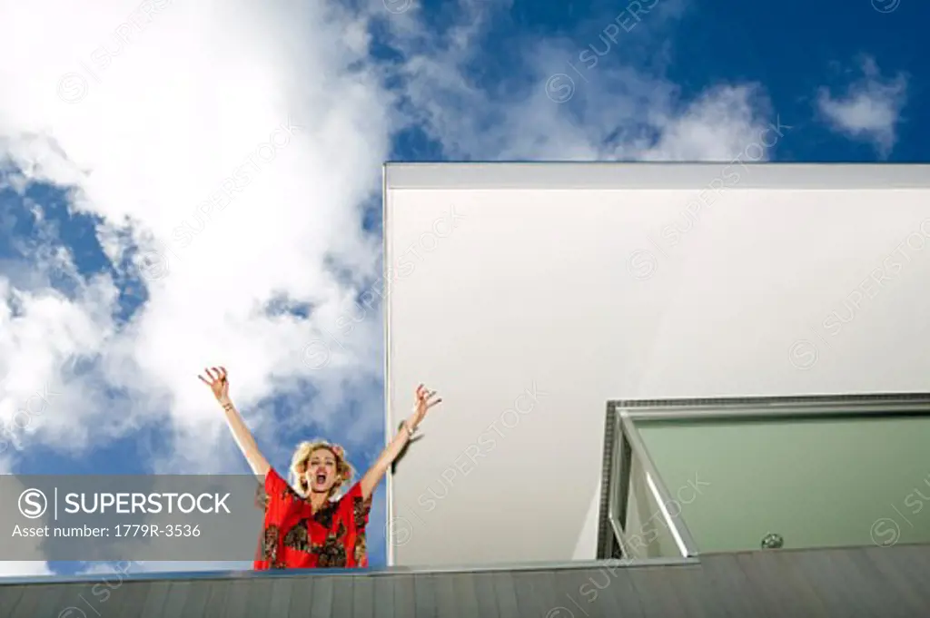 Woman shouting from balcony