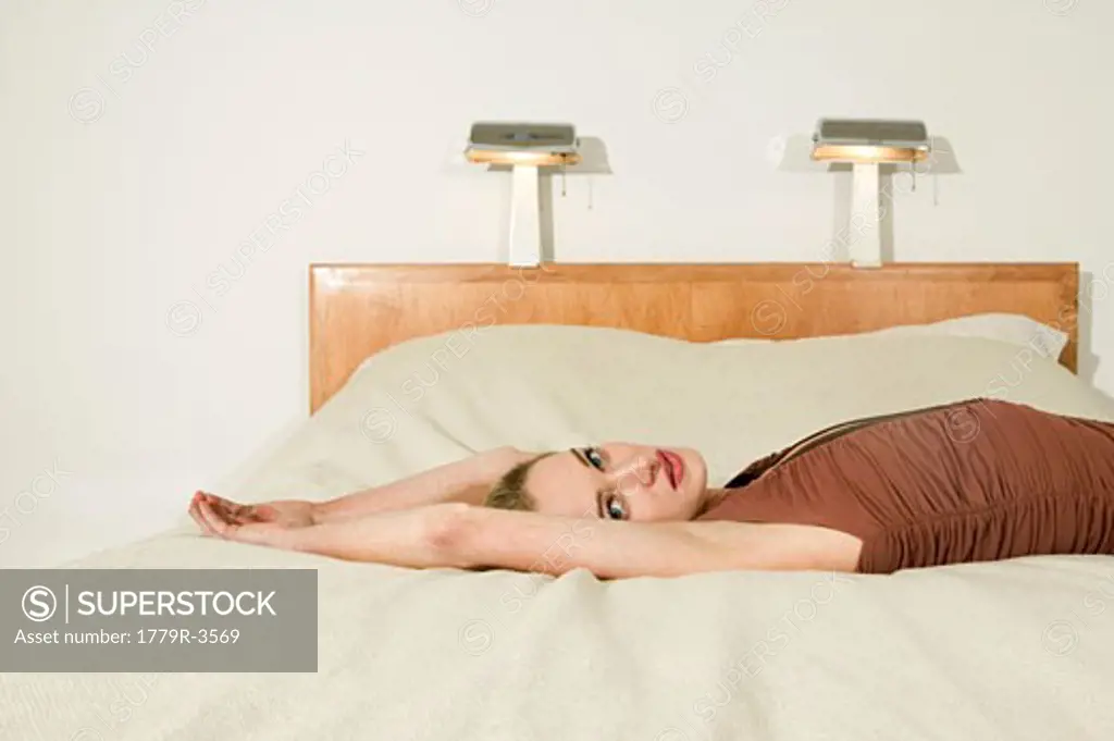 Woman laying on bed