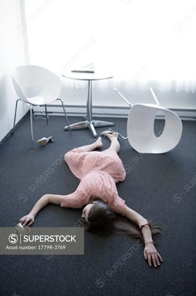 Woman laying on ground