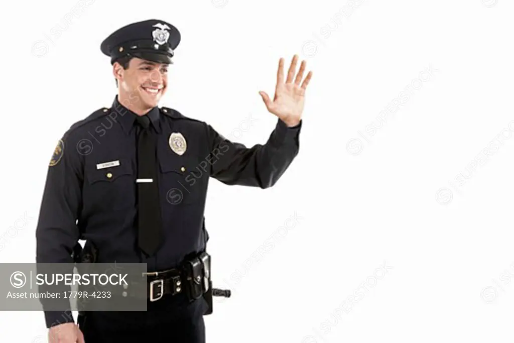 Male police officer waving