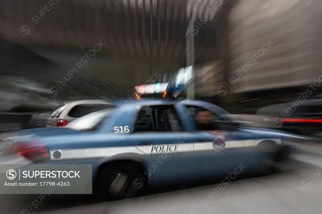 Blurred view of police car