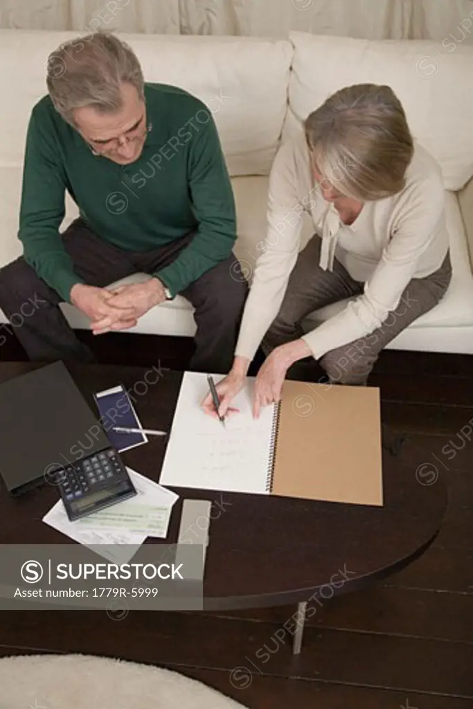 Mature couple doing their taxes