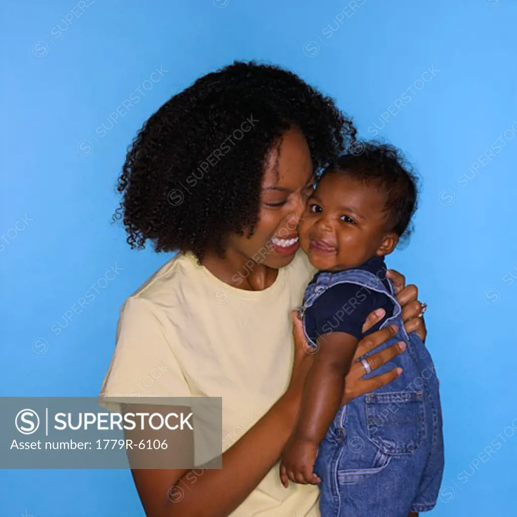 African mother holding baby