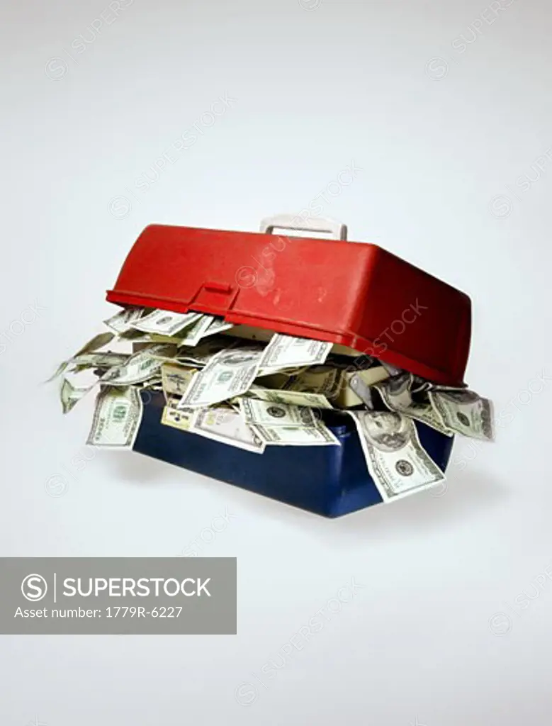 Tackle box stuffed with currency